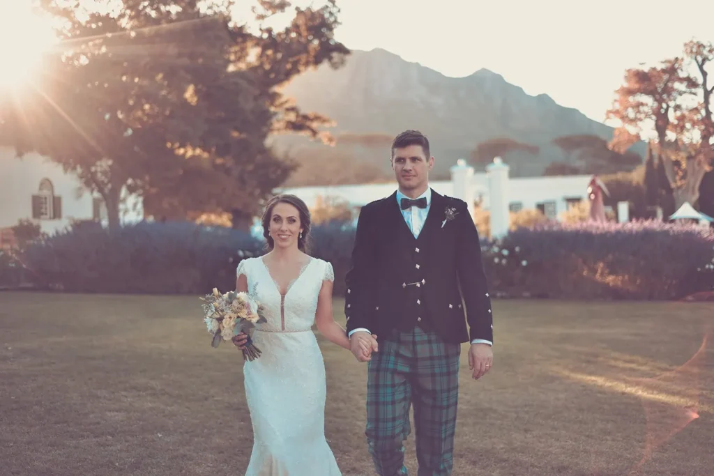 couple golden hour lawn tartan kilt mountain