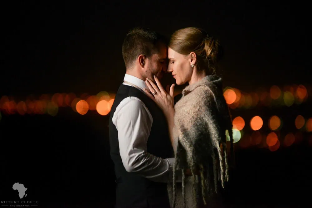 couple intimate night portrait cape town city lights