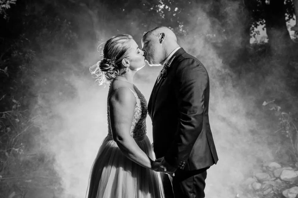 couple kissing smoke garden night franschhoek
