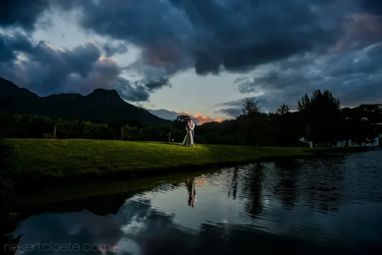 couple mountain dam reflection blue dusk