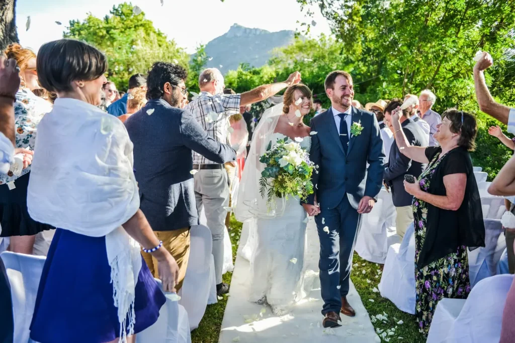 couple outdoor ceremony mountain white petal shower