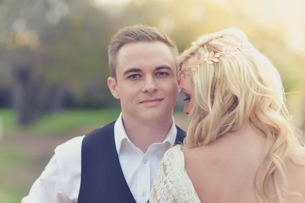couple portrait golden light rose gold headpiece
