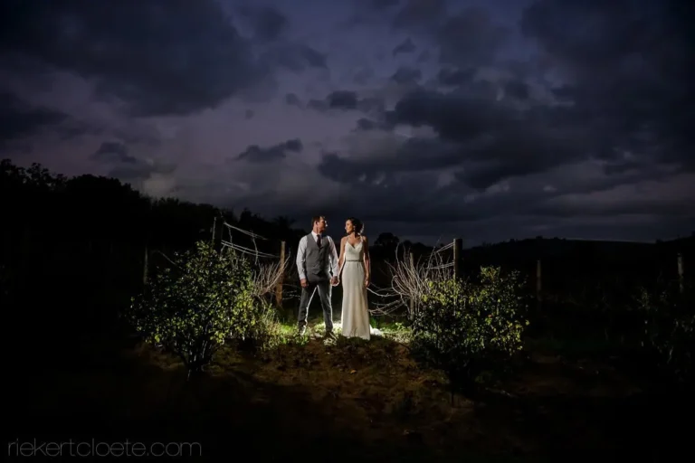 couple vineyard night dramatic storm clouds