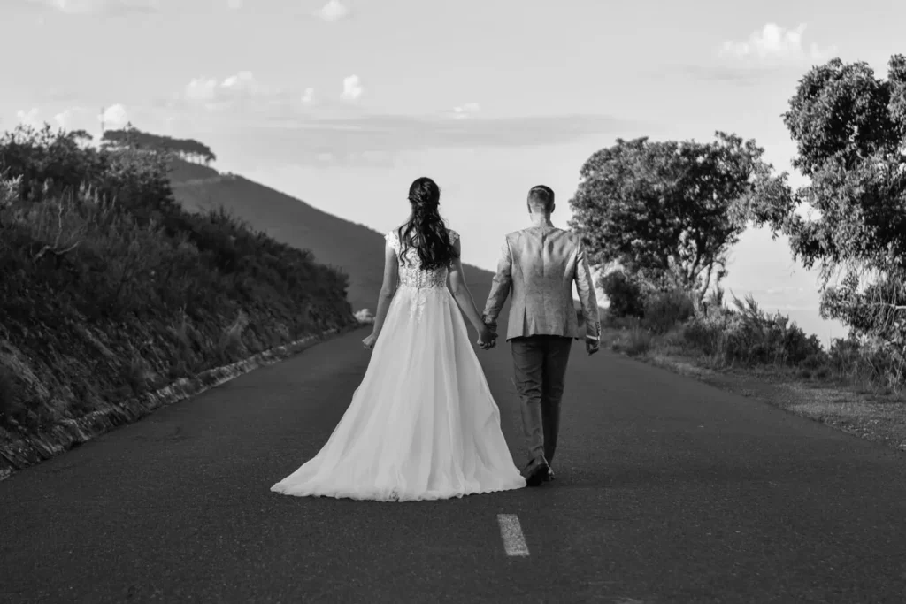 elopement couple coastal mountain road ocean