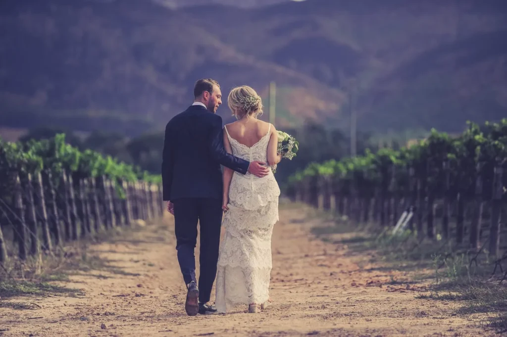 franschhoek couple vineyard lace gown mountain walk