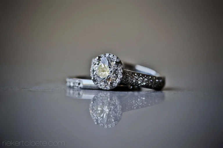 gold wedding band diamond eternity ring green bokeh