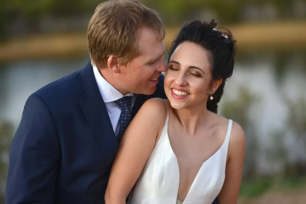 groom nuzzling bride neck stellenbosch portrait
