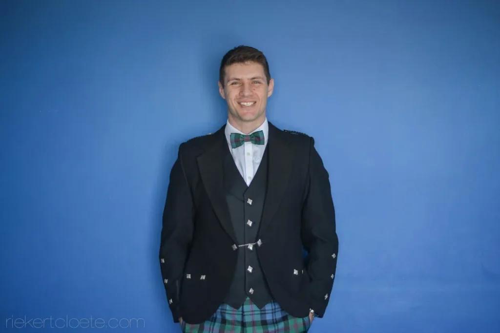 groom scottish kilt black jacket tartan bow tie