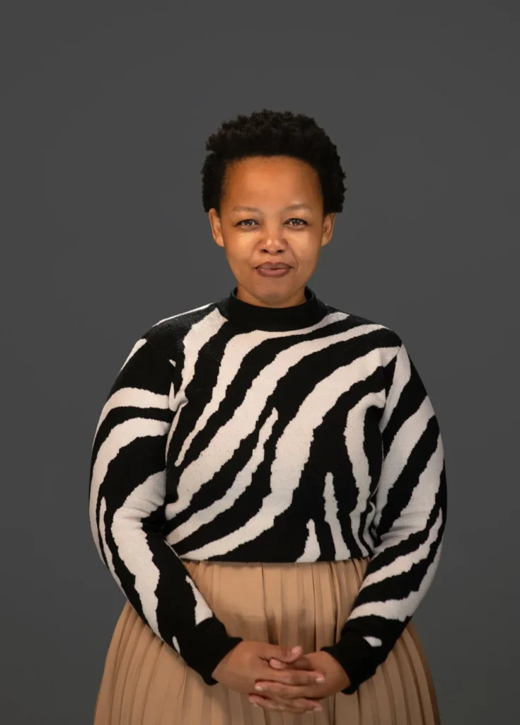 headshot photographer cape town dark grey background 10 woman professional confident