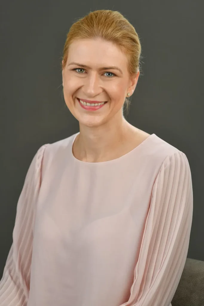 headshot photographer cape town dark grey background 14 woman warm smile