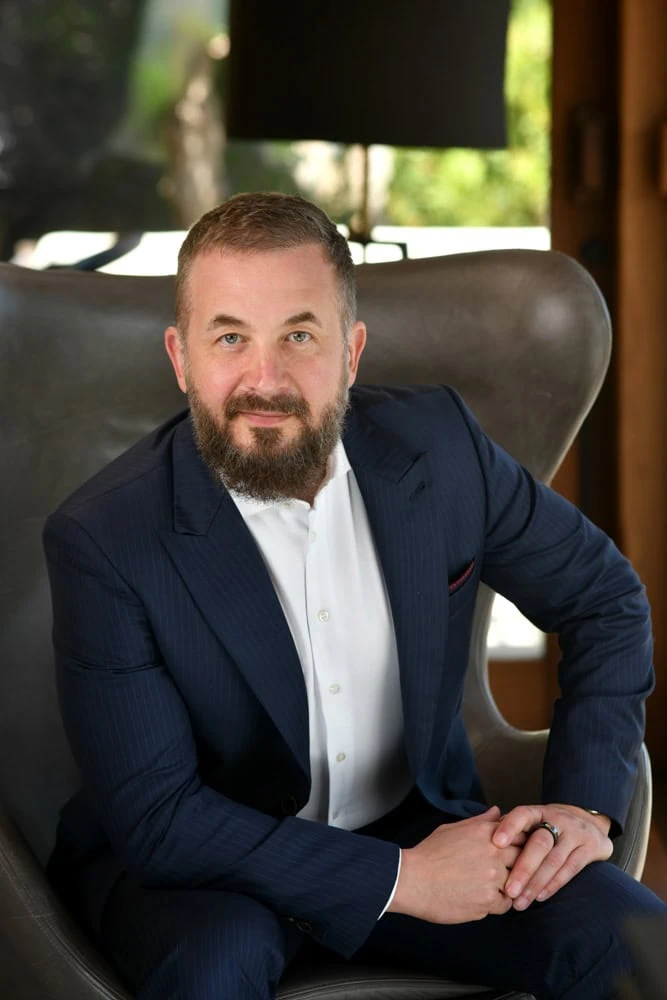 Man with a beard, professional headshot, lifestyle portrait