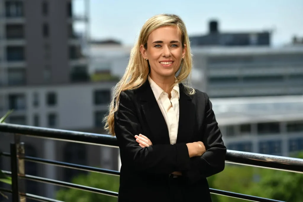 Woman, poised and professional, outdoor headshot