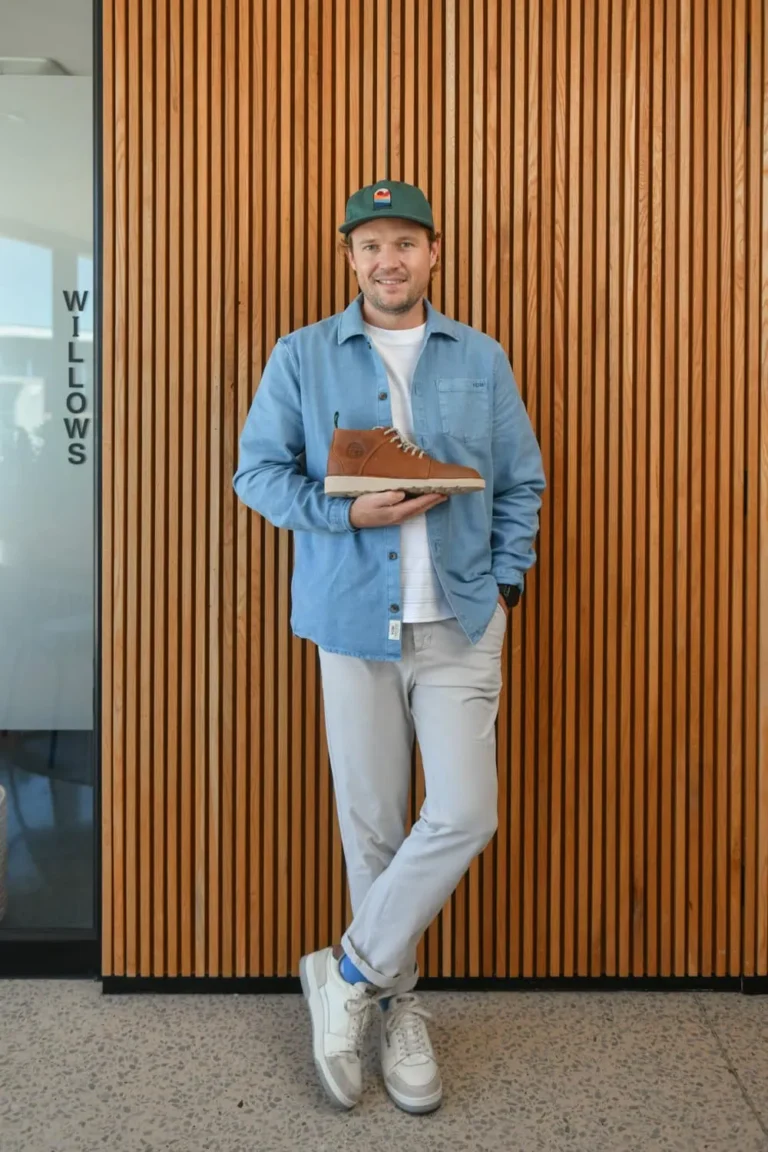 Man, casual smile, in the workplace