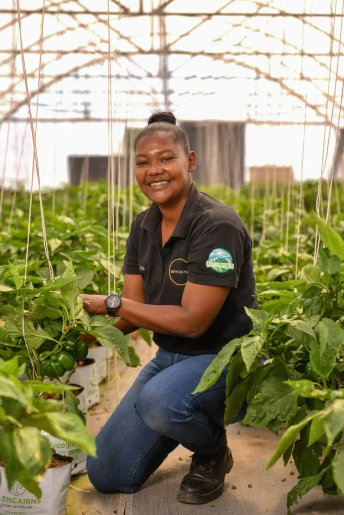 headshot photographer cape town work environment 11 woman greenhouse smile