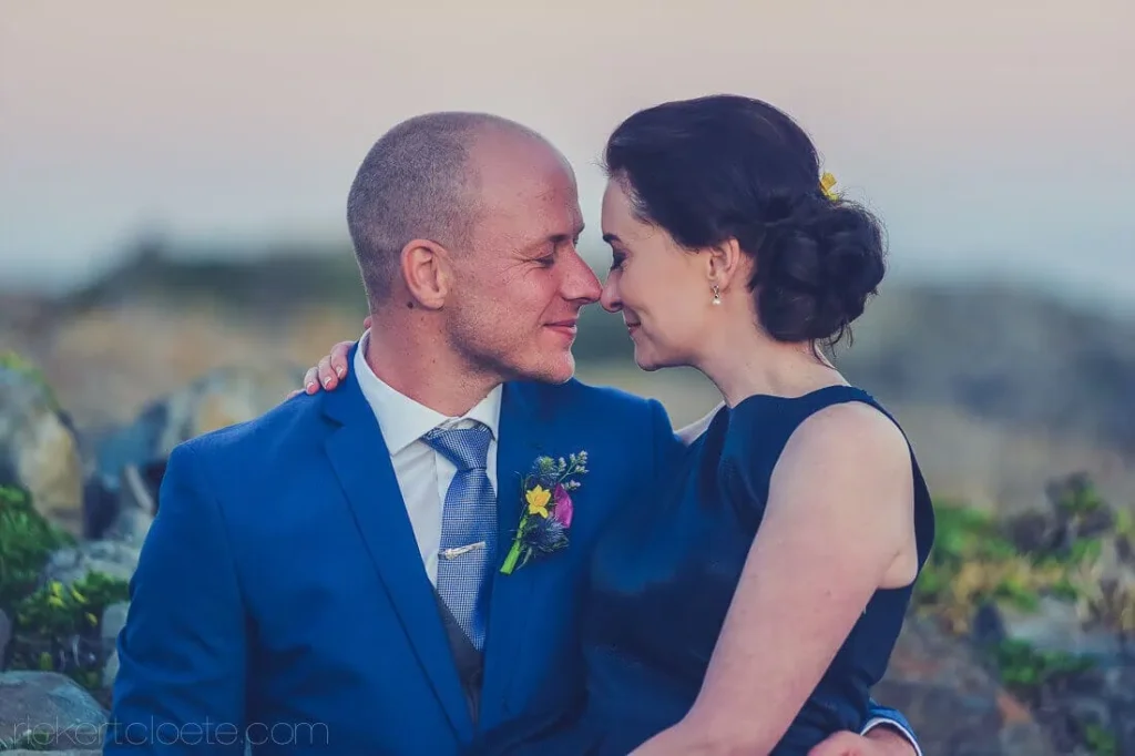 hermanus couple nose to nose coastal sunset portrait