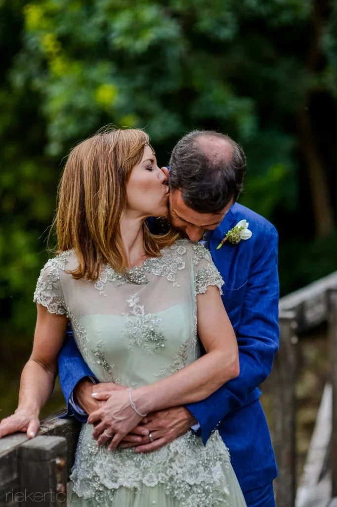 holden manz couple kissing wooden bridge franschhoek