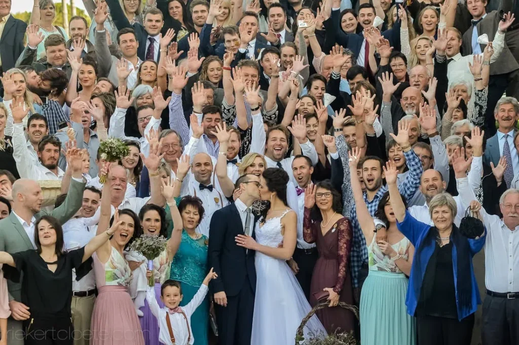 large wedding group cheering guests tiered steps