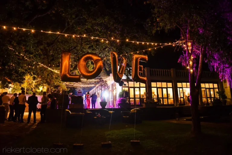 love sign fireworks outdoor wedding reception night