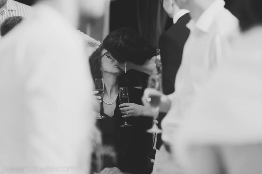 mother kissed on cheek wedding champagne toast