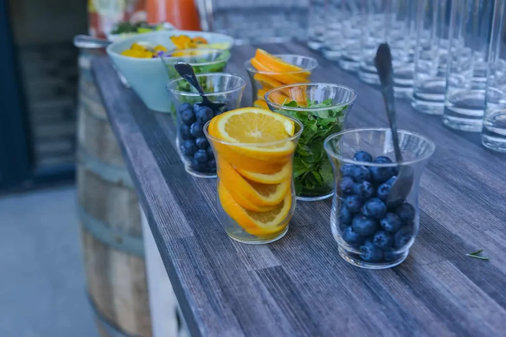 orange blueberry water bar wedding drinks