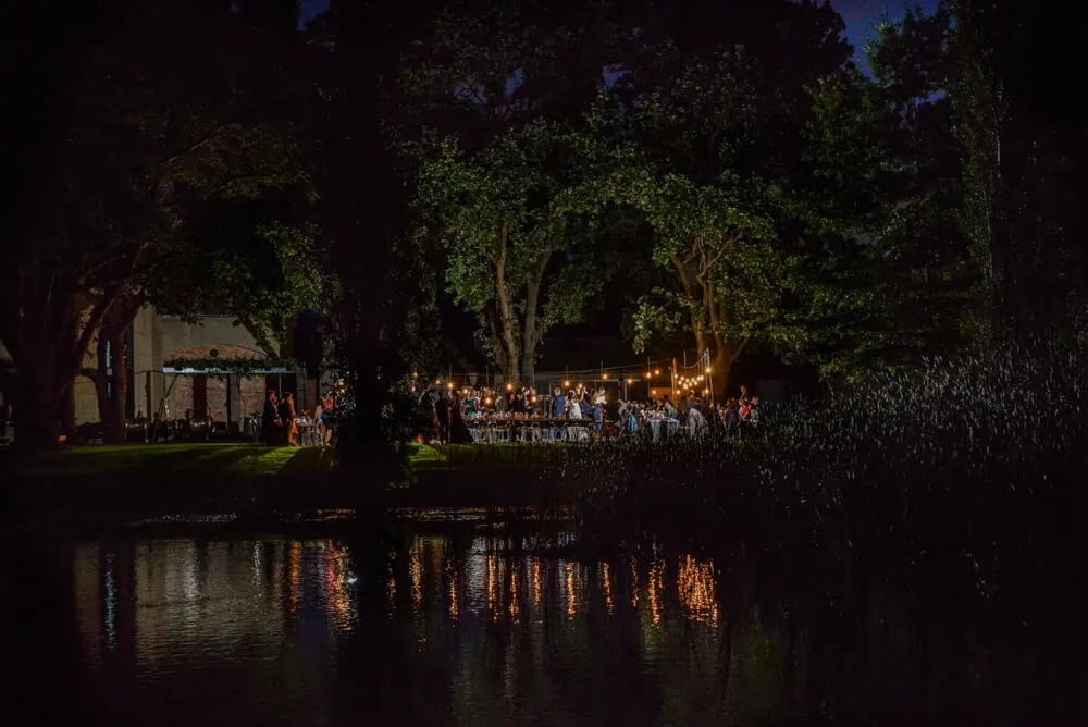 outdoor reception dam fairy lights night
