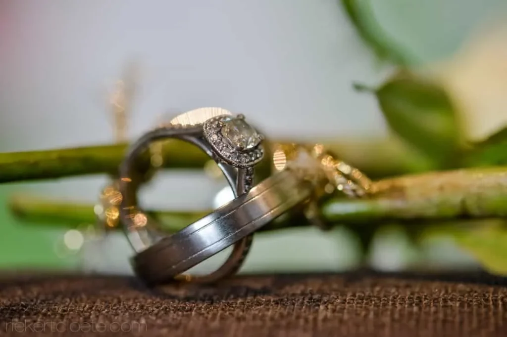 oval diamond halo ring titanium band burlap foliage