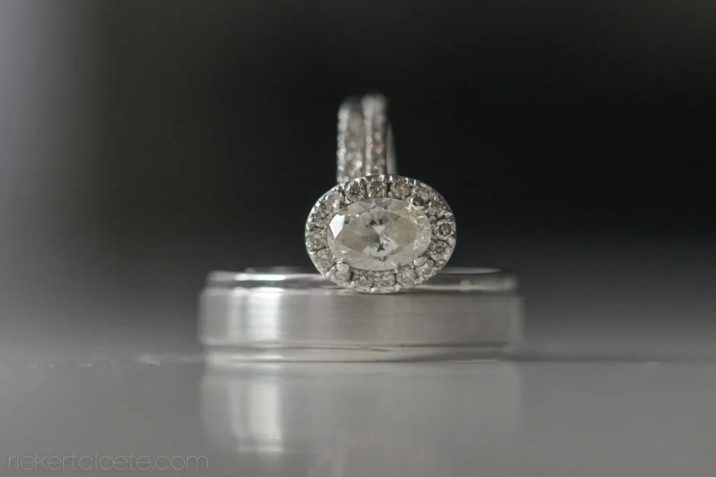 oval halo diamond ring brushed silver grooms band