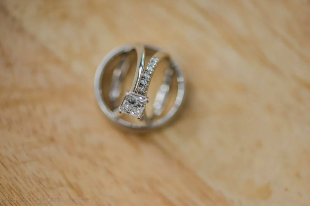 princess cut ring cage style silver grooms band