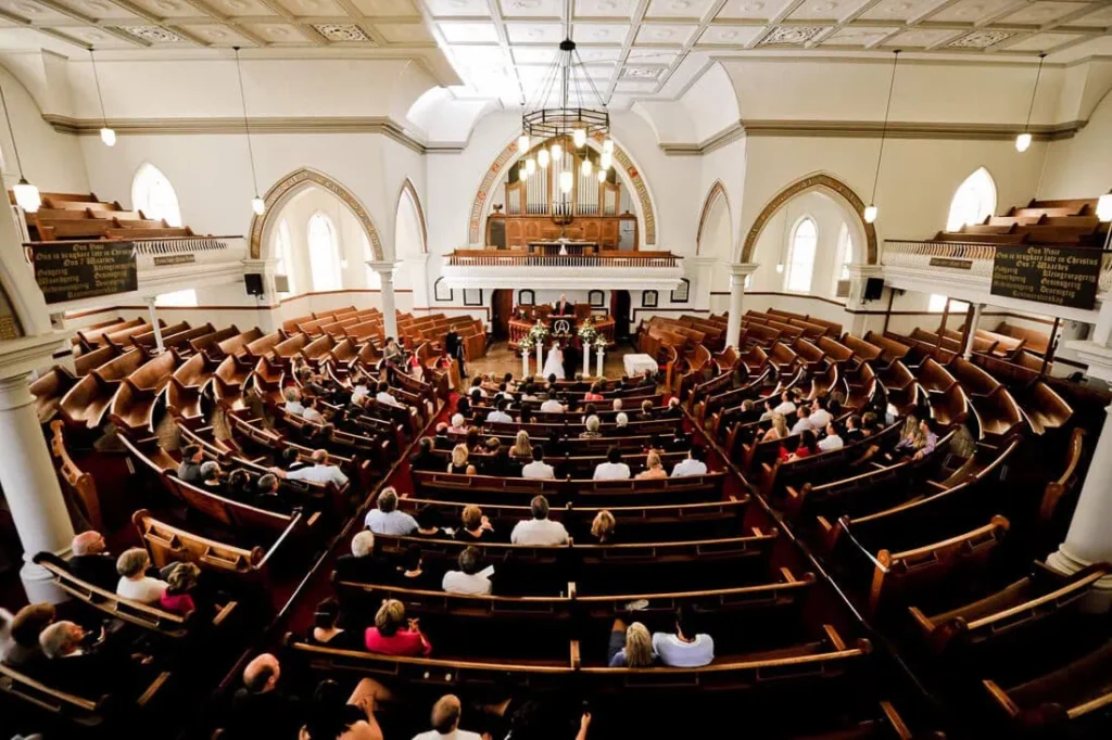 robertson church ceremony curved tiered pews wide angle