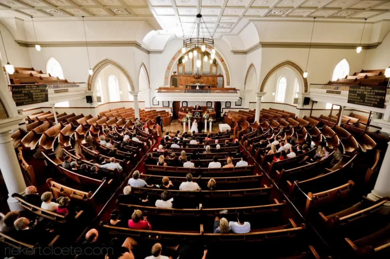 robertson church curved pews pipe organ elevated view
