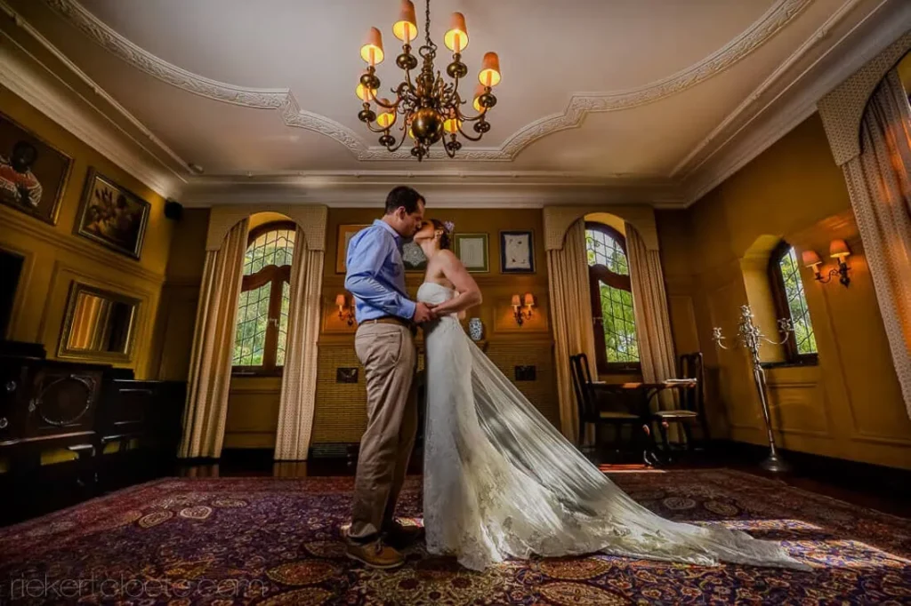 stellenbosch couple kissing elegant manor interior