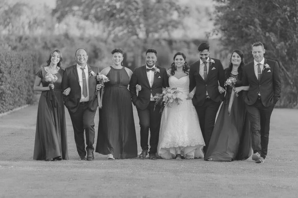 stellenbosch wedding party walking lawn black white
