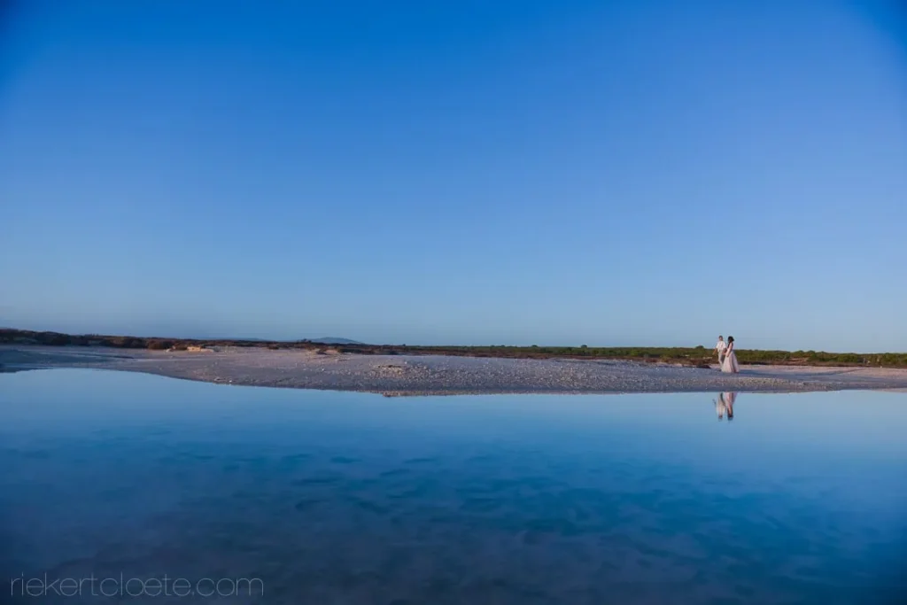 strandkombuis couple tidal flat yzerfontein reflection