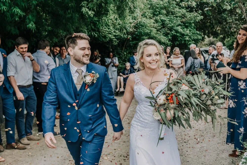 v Allesverloren couple colorful petal shower forest garden ceremony