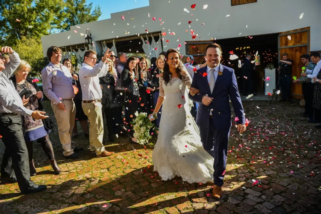 v langkloof roses chapel exit colorful confetti shower