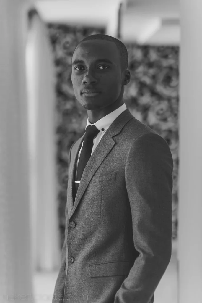 val de vie groom grey suit hall pensive portrait