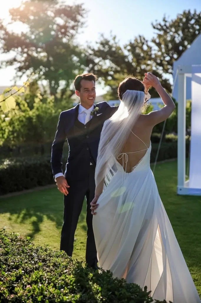 vrede en lust groom twirling bride garden golden hour