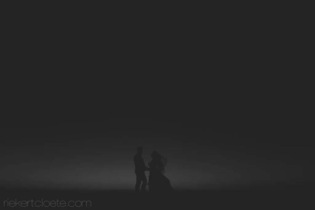 wedding couple silhouette misty dark night moody