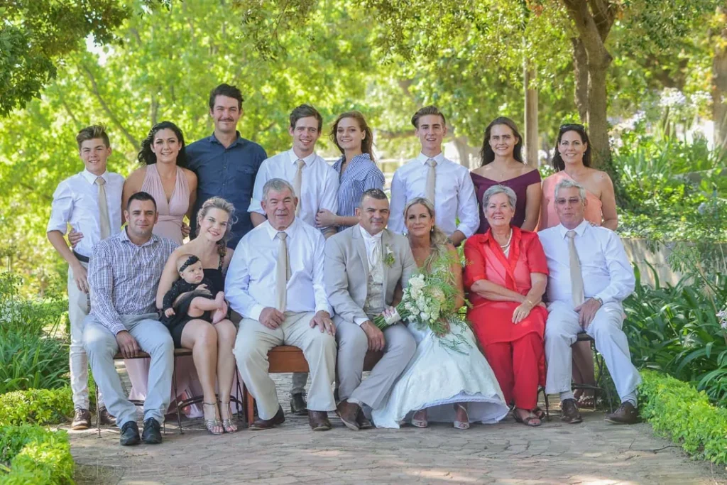 wedding family portrait shaded garden formal group