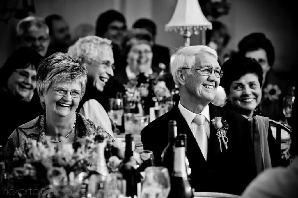 wedding parents laughing reception speech moment