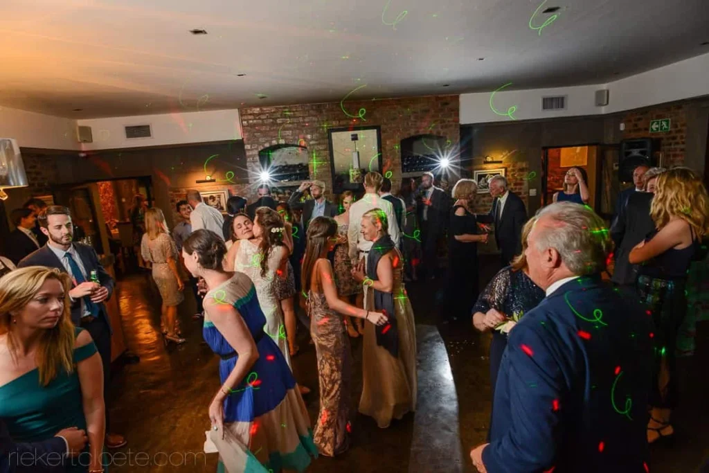 wedding reception dancing disco lights brick venue