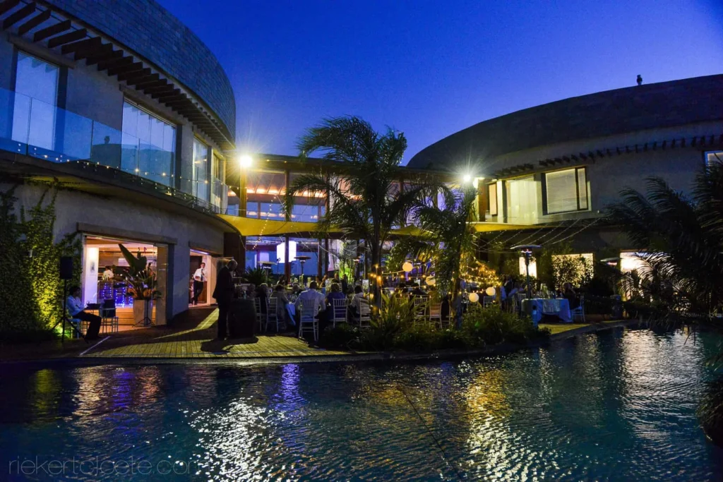 wedding reception poolside modern venue blue hour