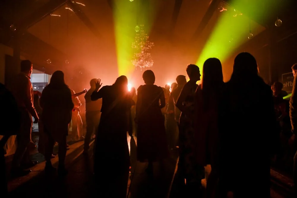 winelands wedding reception dancing dramatic stage lights