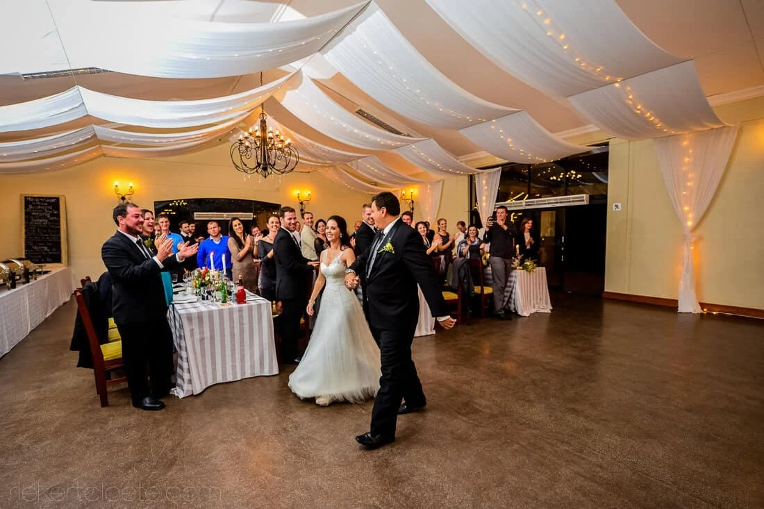 Couple grand entrance draped reception hall cheering – Allesverloren, Riebeek Valley & Swartland