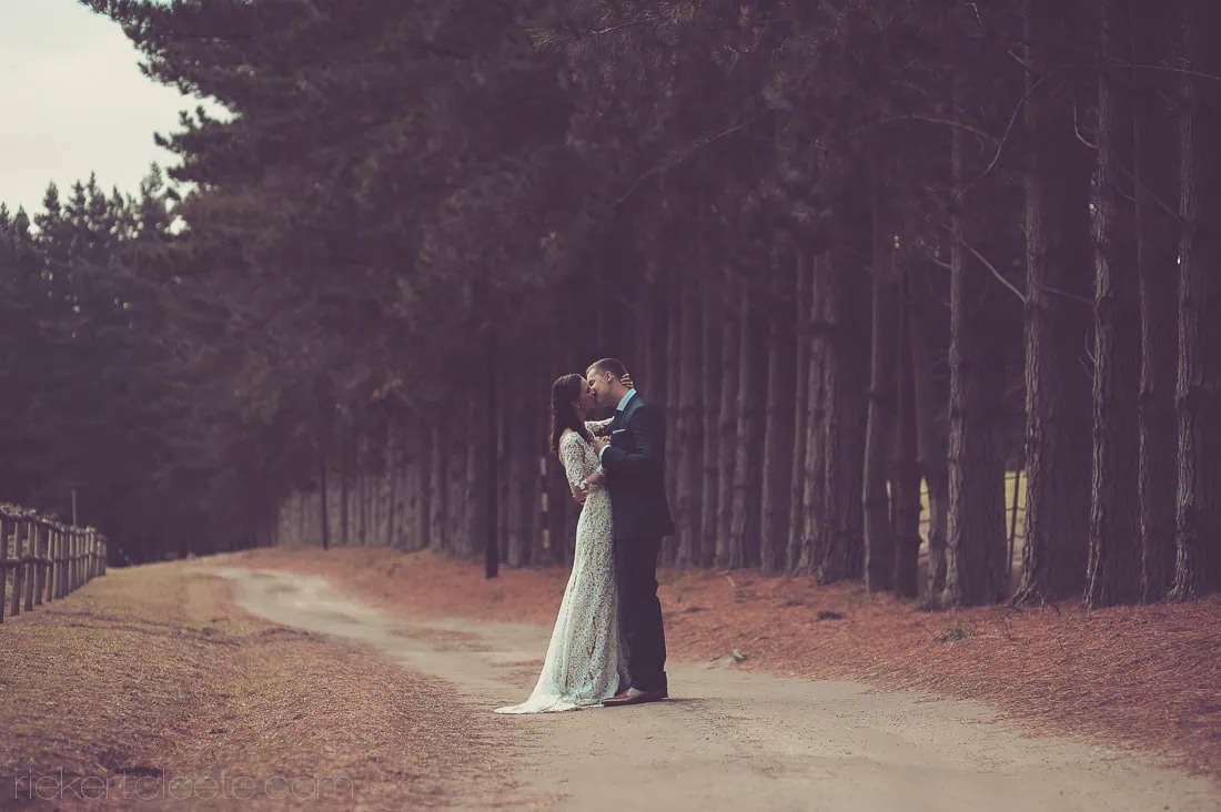 Stellenbosch couple kissing pine tree path moody – Bona Dea Estate, Hermanus
