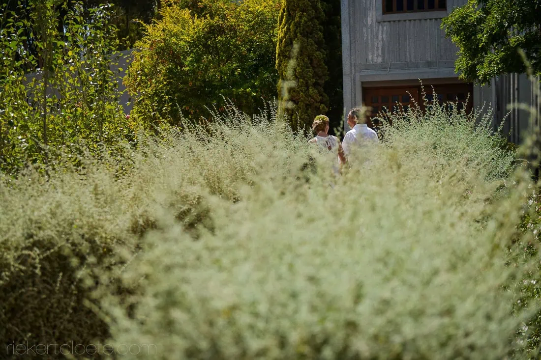 De malle meule couple walking flowering garden – De Malle Meul, Riebeek Valley & Swartland