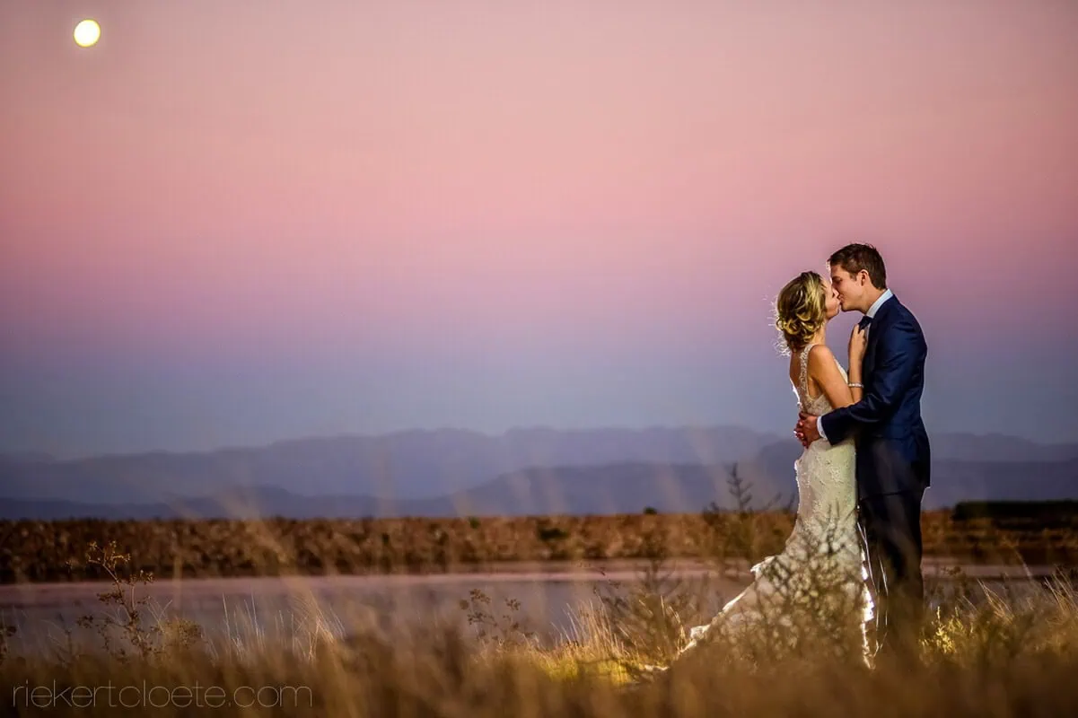 Couple kissing lavender moonrise sunset landscape – Groenrivier Function Centre, Riebeek Valley & Swartland