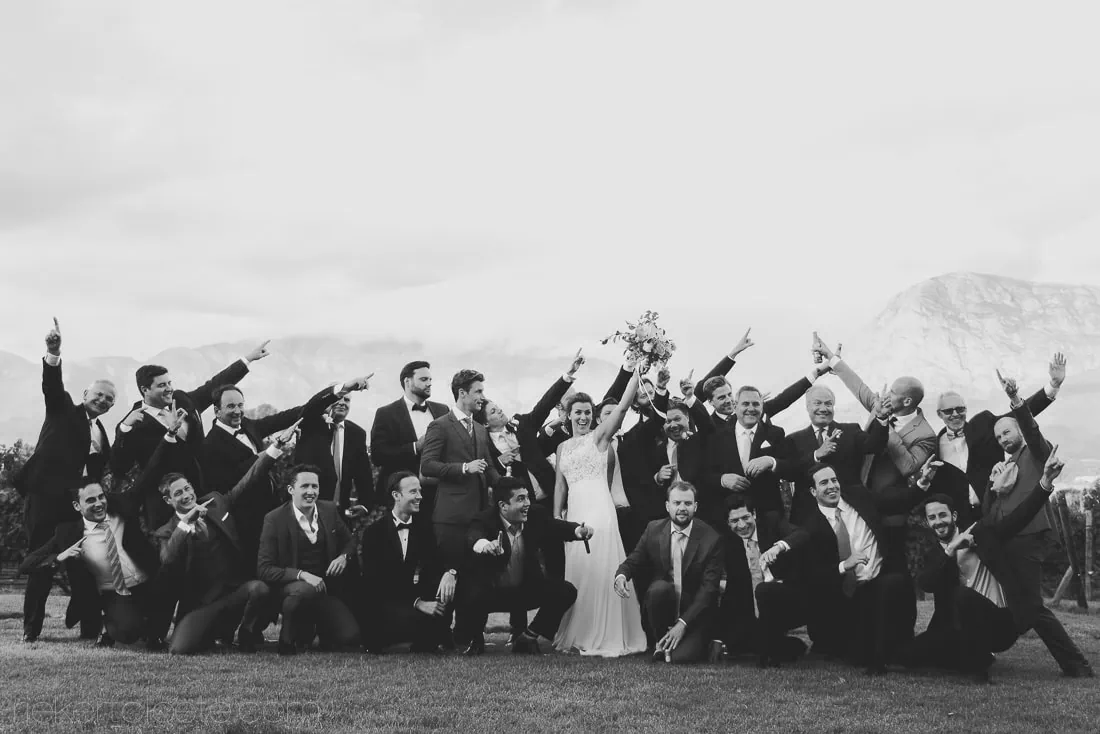 Black white wedding group mountain hillside – Holden Manz Wine Estate, Franschhoek