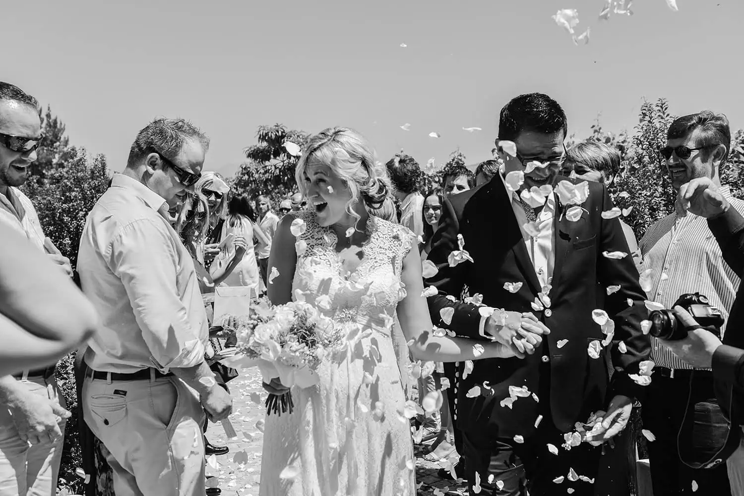 Couple outdoor petal confetti ceremony exit guests – Mont Marie, Stellenbosch