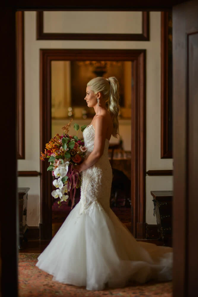 Bride lace mermaid gown orchid bouquet ornate interior – Nooitgedacht Estate, Stellenbosch